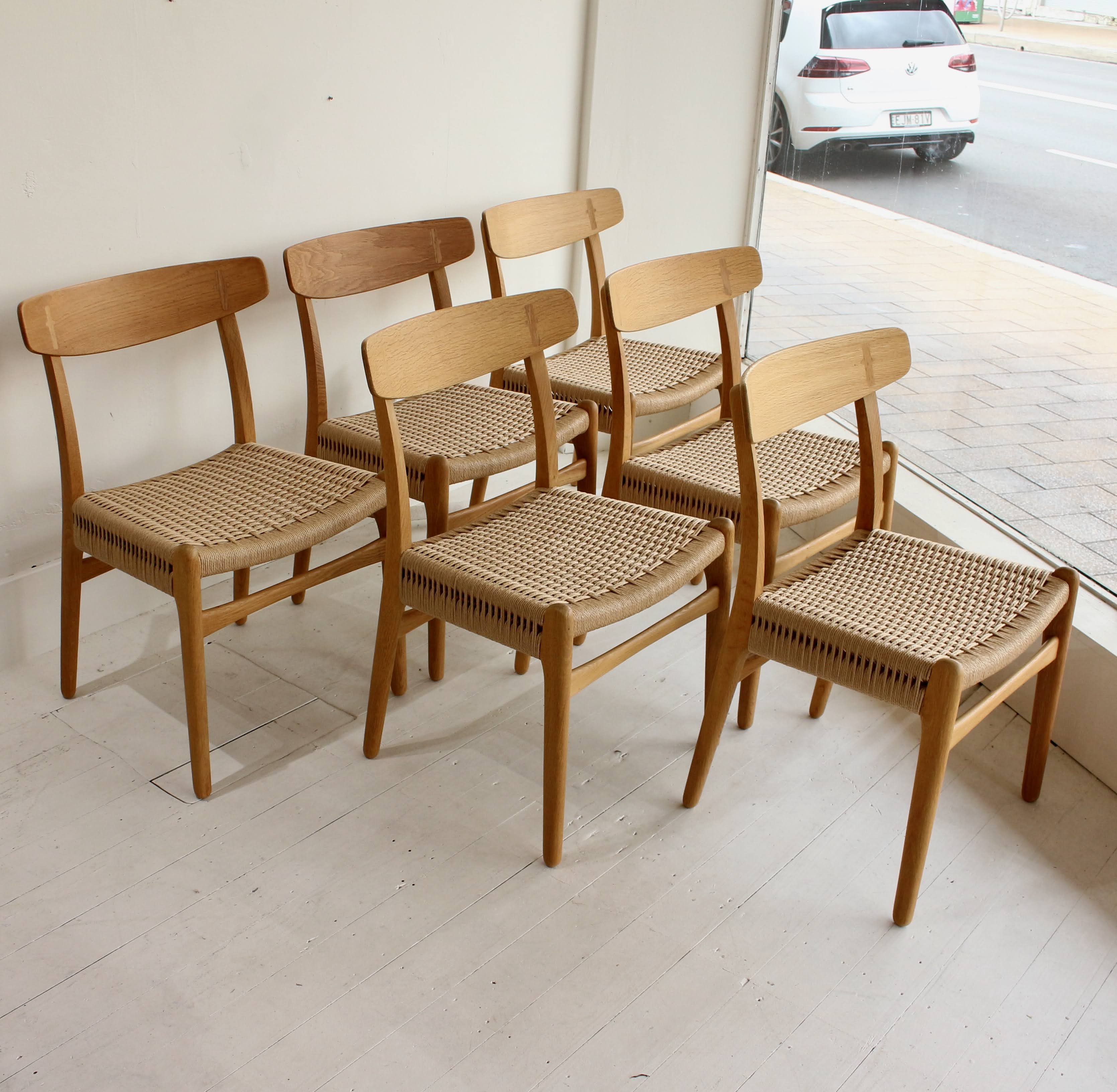 Set of six Hans Wegner oak dining chairs. Model CH23 – Juliet's Balcony