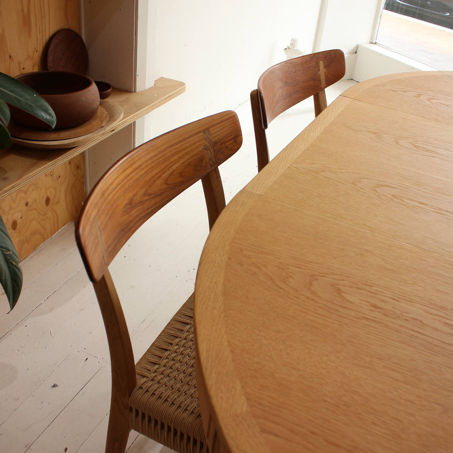 Hans Wegner teak and oak dining chairs. Model CH23