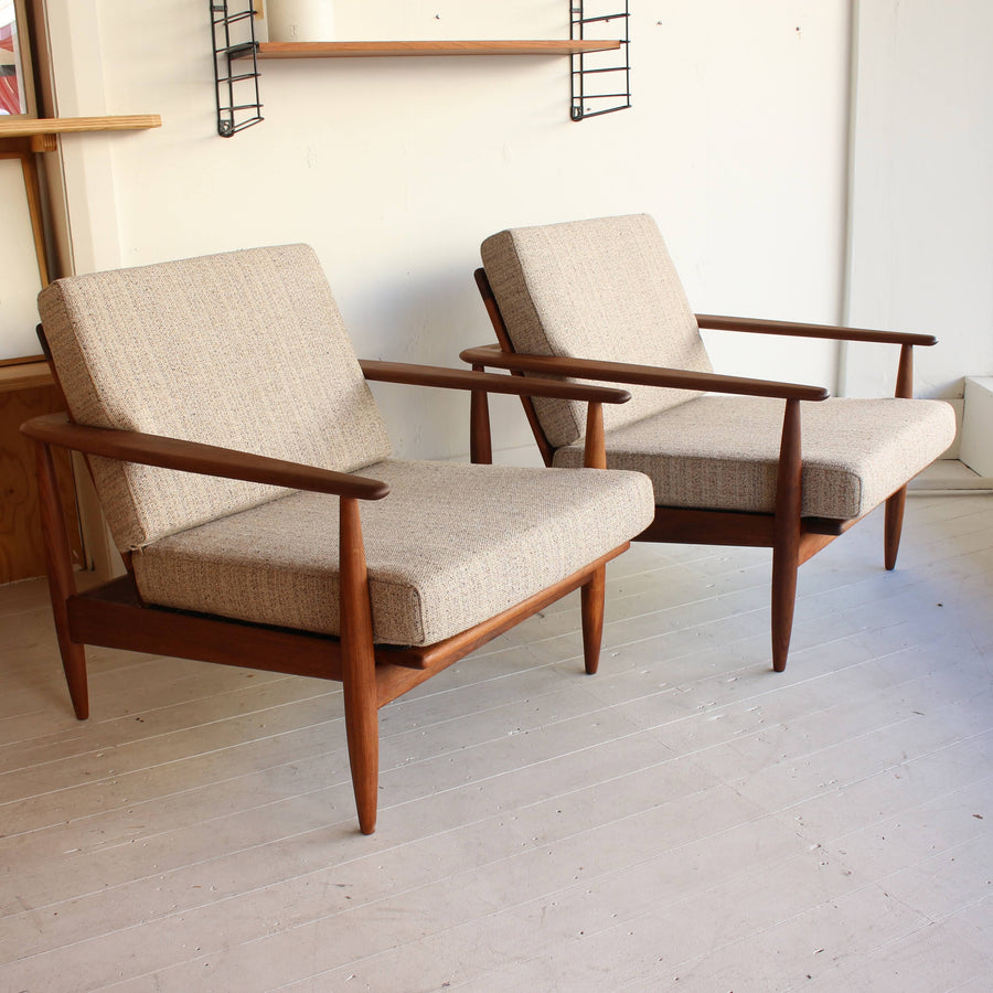 Pair Parker 'wraparound' armchairs