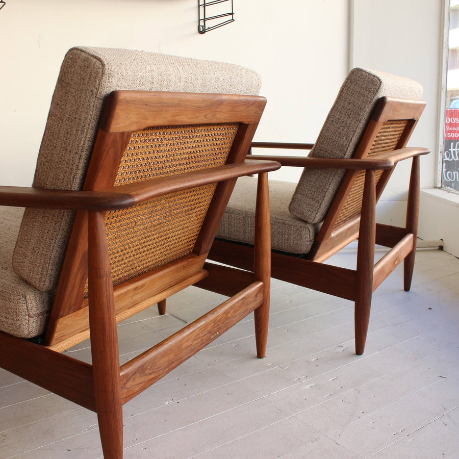 Pair Parker 'wraparound' armchairs