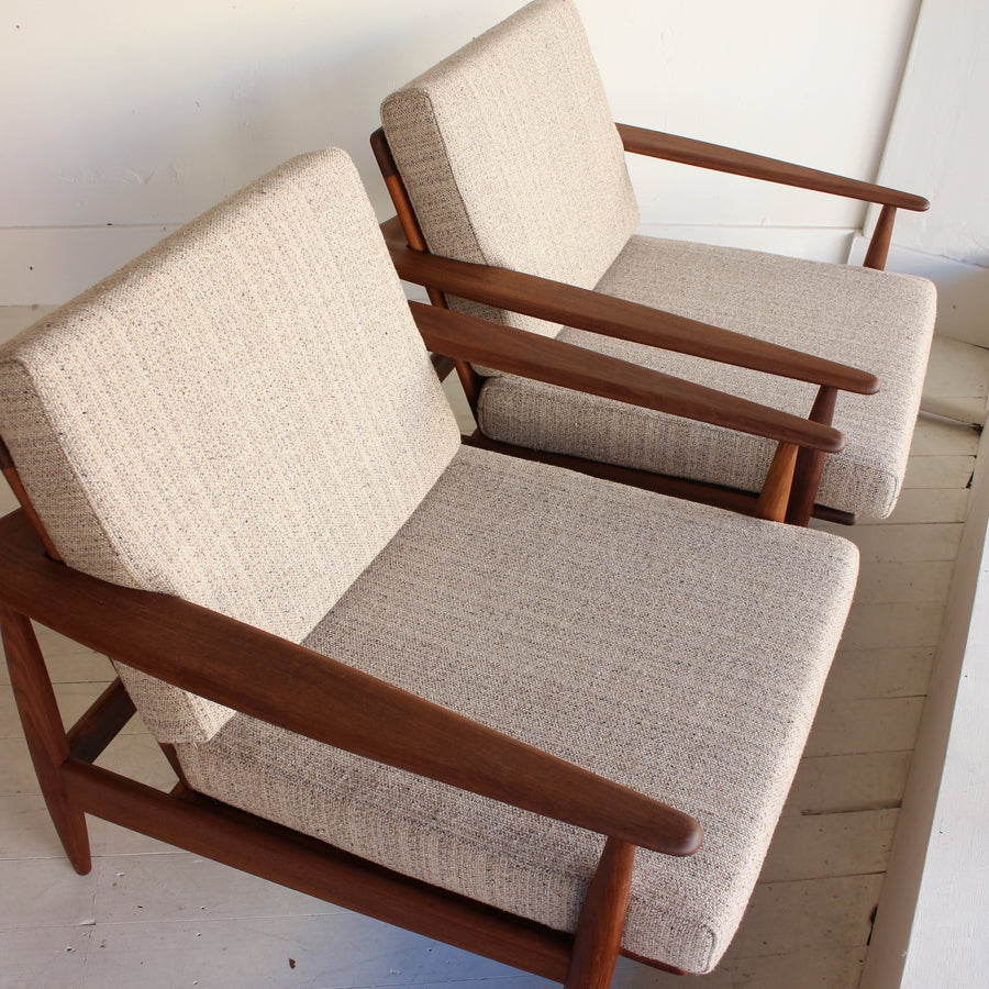 Pair Parker 'wraparound' armchairs